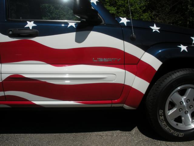 Passenger side front door of Flag Jeep