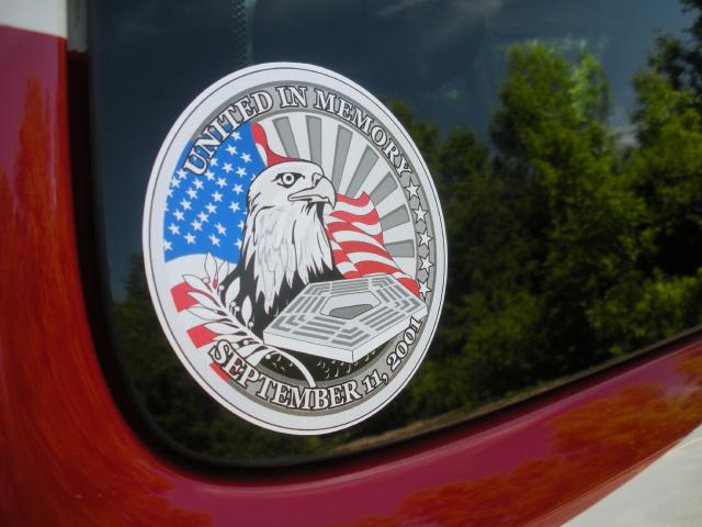 Sept 11 Memorial Sticker on window of Flag Jeep