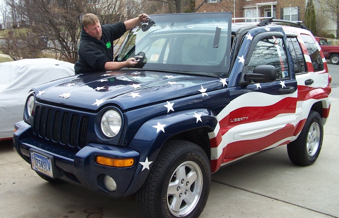 Windshield being installed