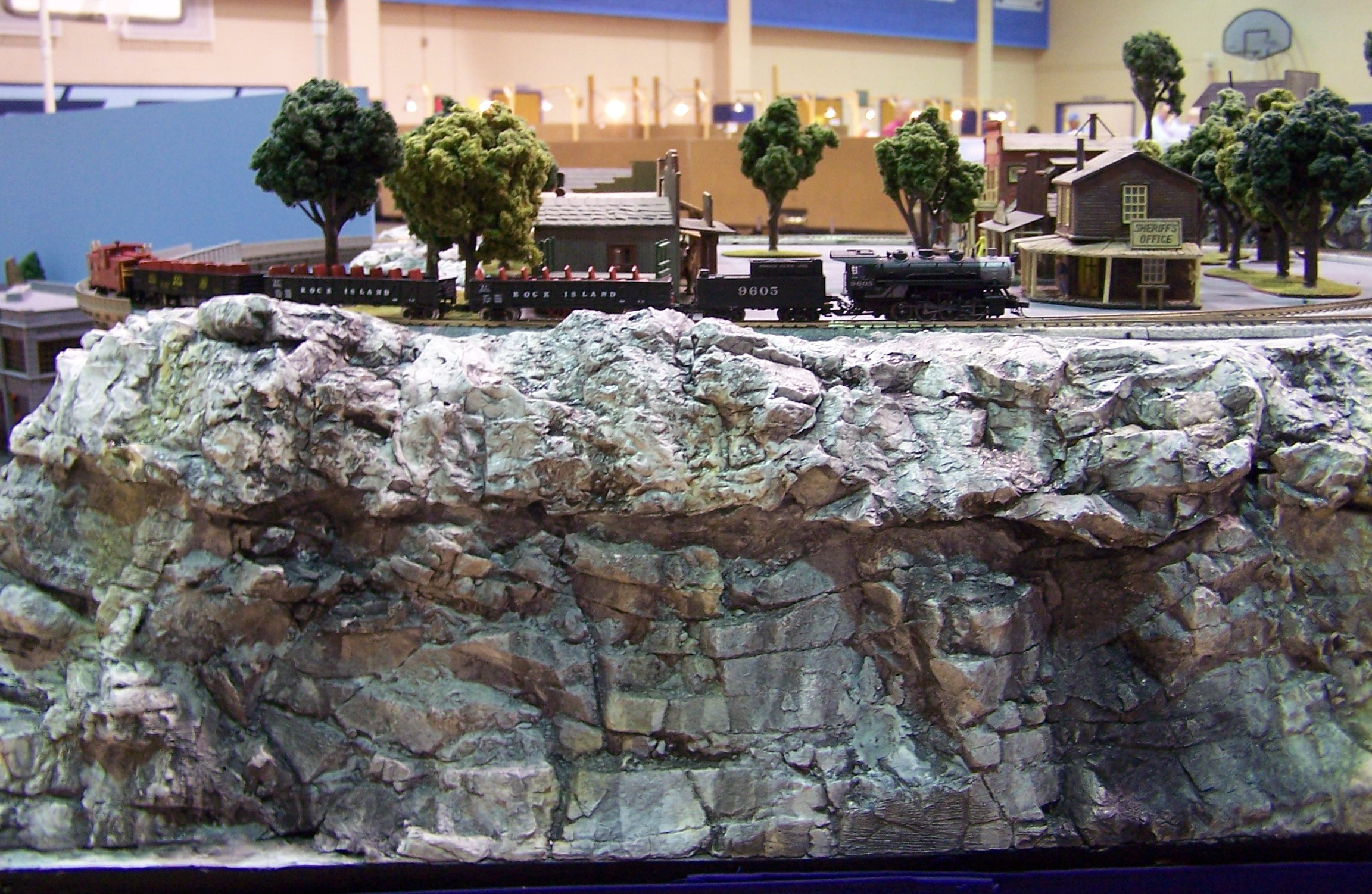 The passenger train runs along the top of the 
          cliffside.