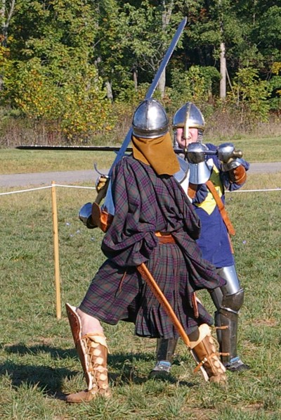 Angus Fraser attempts to best Sir Michael.