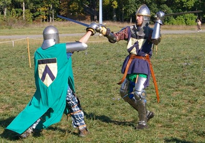 Squire Matthew attacks Squire Riochard.